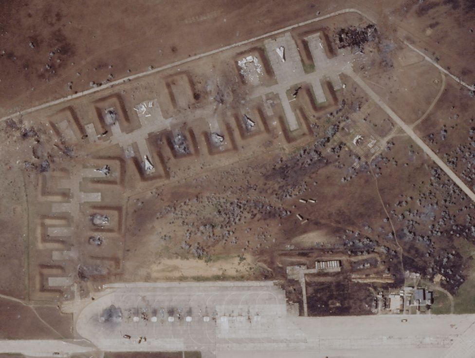 The Saky airbase on 10 August - after the explosions. Several damaged warplanes are visible