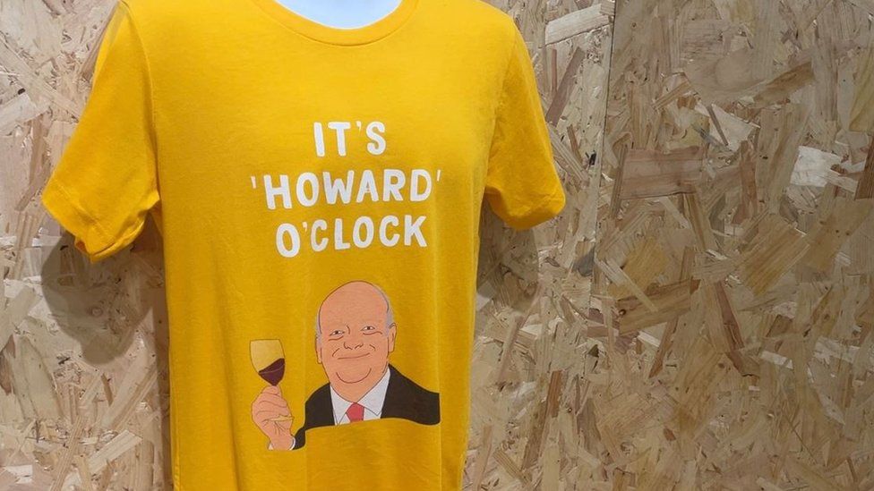 A photo of a t-shirt which reads 'it's Howard o'clock'