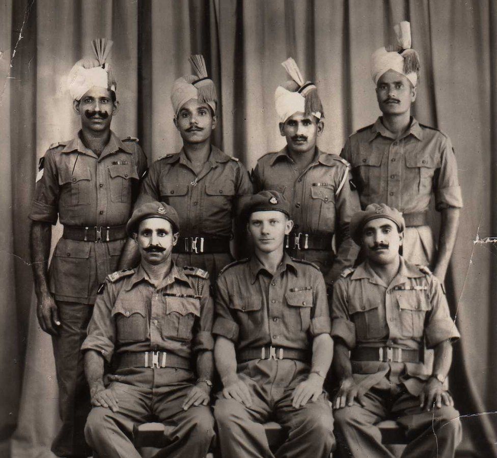 Robin Rowland (seated, centre) with members of the Punjab regiment, pictured in Bangkok in 1945