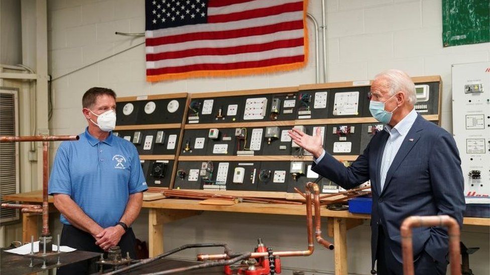 U.S. Democratic presidential candidate Joe Biden tours United Association (UA) Plumbers Local 27 during a campaign stop in Erie, PA, U.S., October 10, 2020.