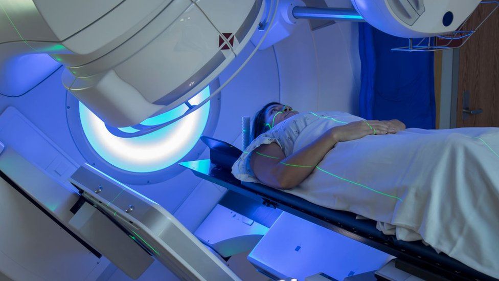 Woman Receiving Radiation Therapy Treatments for Cancer - stock photo