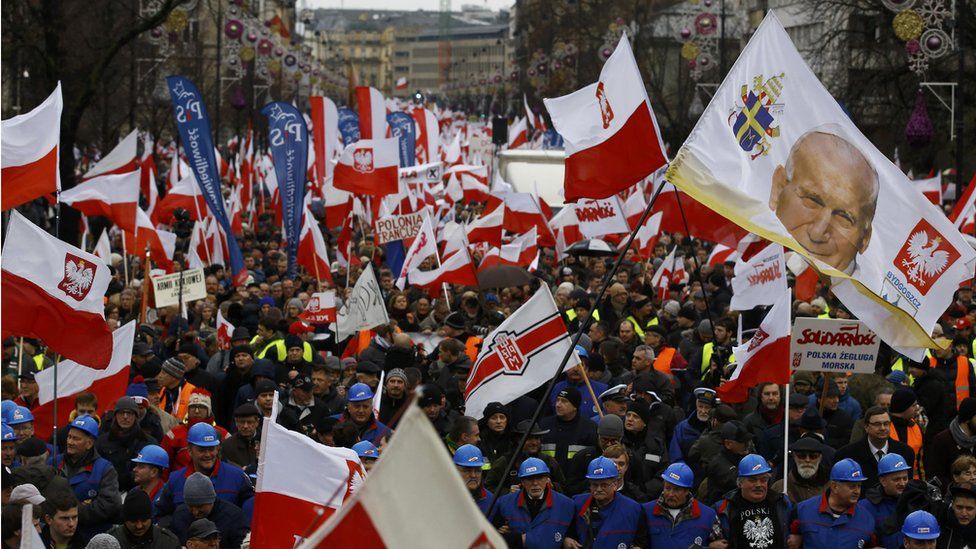 Supporters of the Law and Justice party take part in a pro-government demonstration in Warsaw