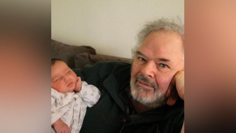 Alan John with his grandson Rohan