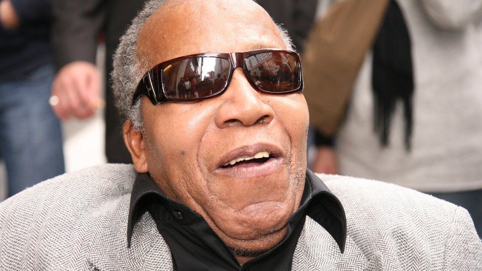 Frank Lucas, in his 70s, in New York wearing sunglasses