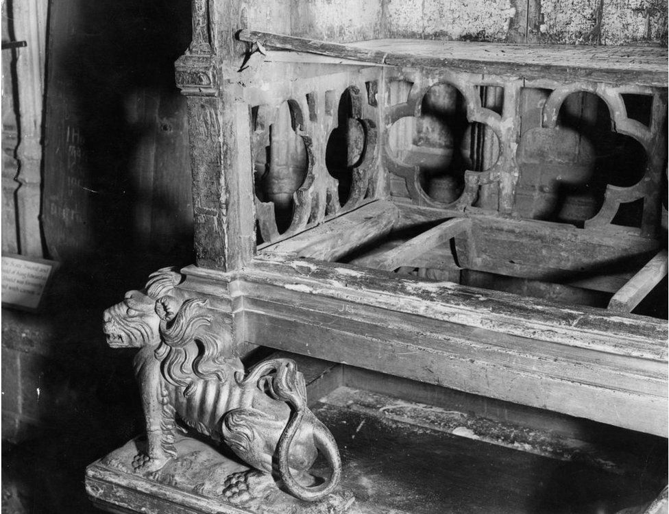 27th December 1950: The Coronation Throne in Westminster Abbey after the theft of the Stone of Destiny, or Stone of Scone. The initials JFS newly carved in the wood may give a clue to the thieves. (Photo by Keystone/Getty Images)
