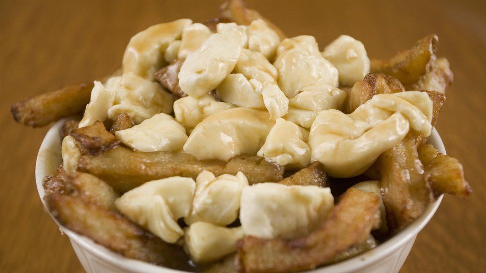 Canadian dish of Poutine - chips, cheese and gravy
