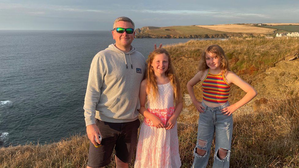 Keiron Gavaghan and two daughters
