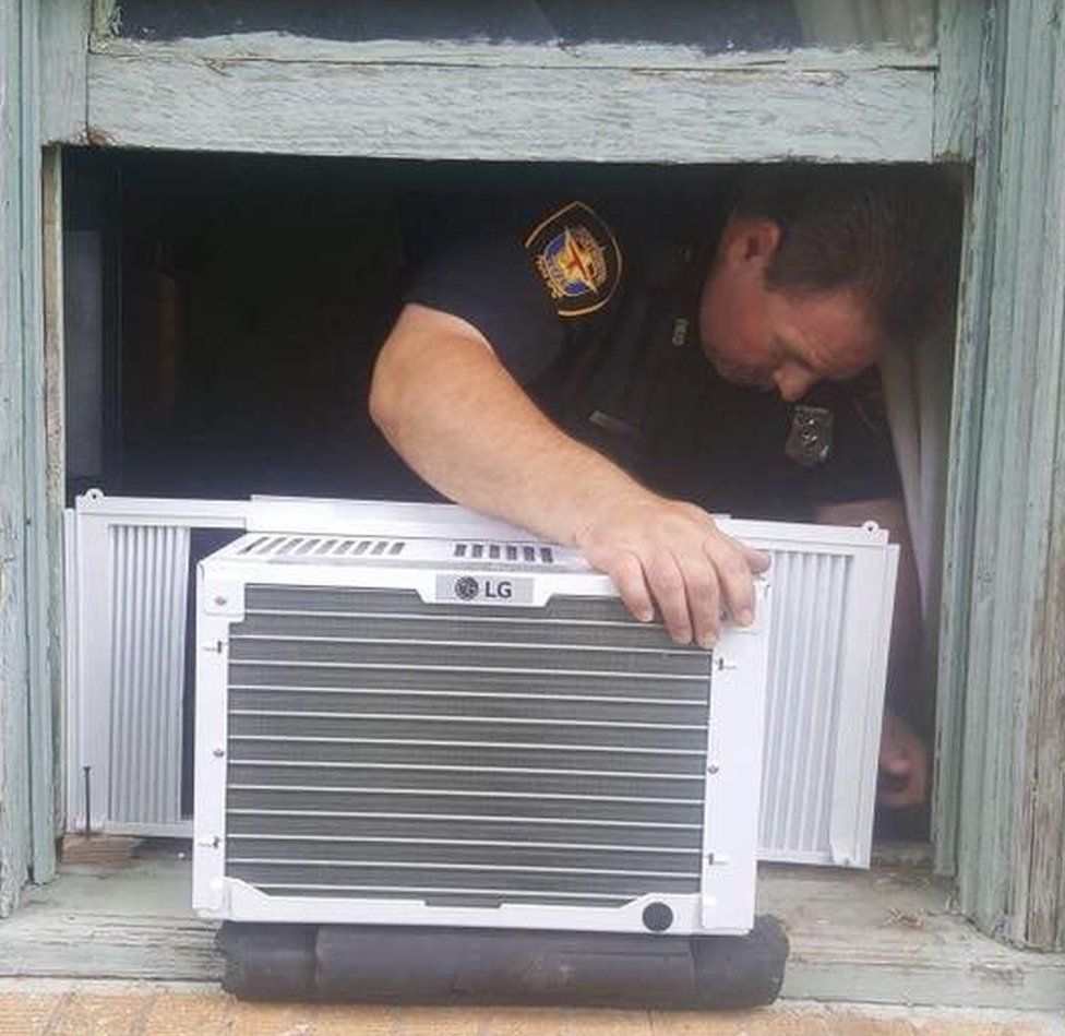 Officers returned to install the new window unit