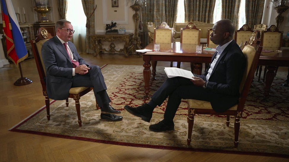 Andrei Kelin and Clive Myrie sitting down during the interview