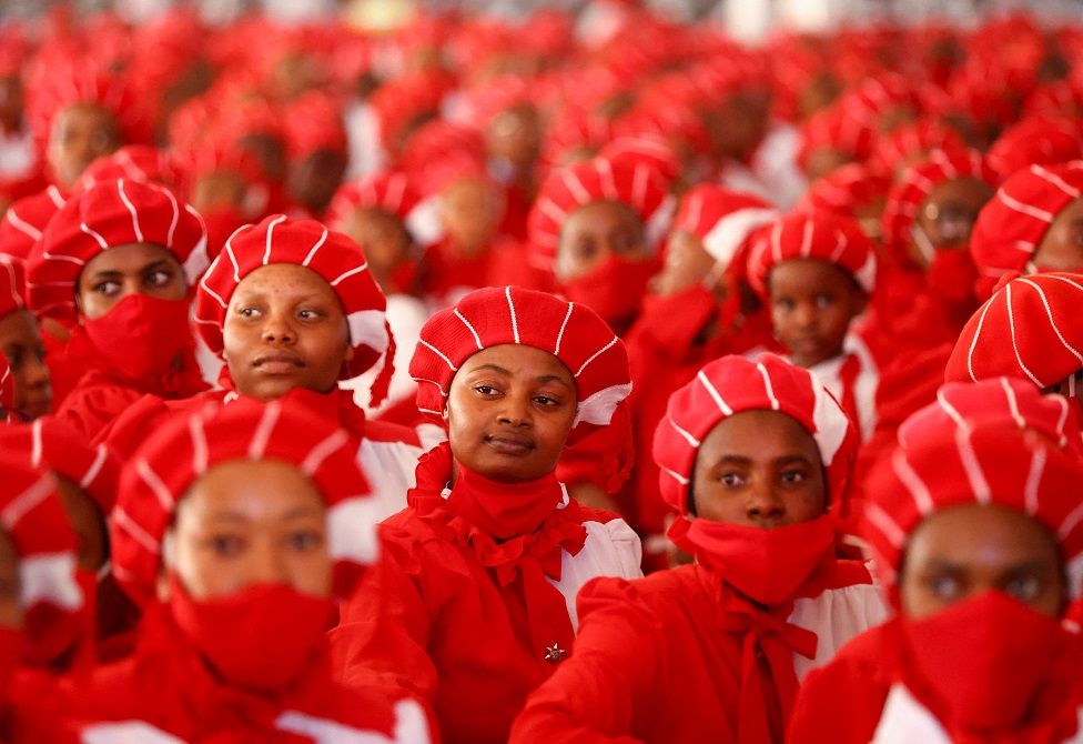 Members of the congregation dressed in matching red.