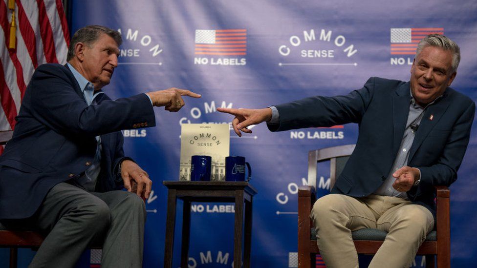 West Virginia Senator Joe Manchin (left), a rumoured No Labels contender, and former Utah Governor John Huntsman, an event in New Hampshire in 2023.