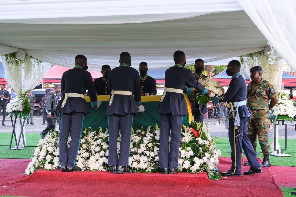 Soldiers tend to Atsu's coffin at the state-assisted funeral.