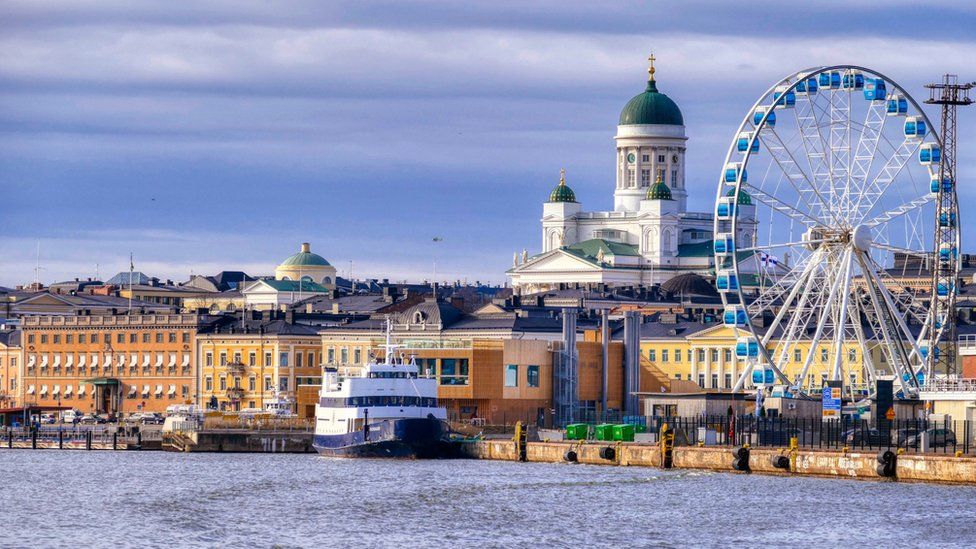 A panoramic view of Helsinki seen from the water.