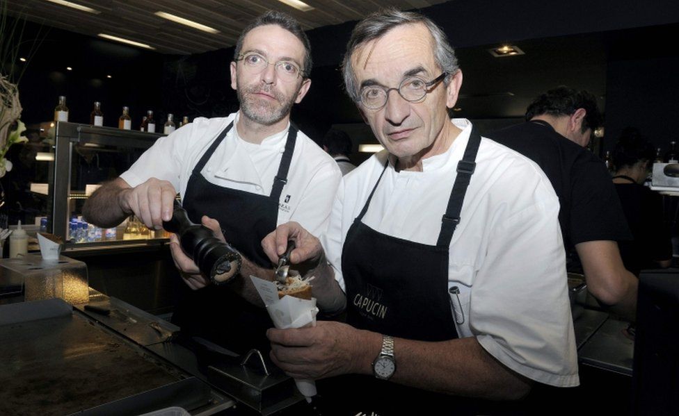 French chef Michel Bras (R) at work with his son, Sebastien Bras