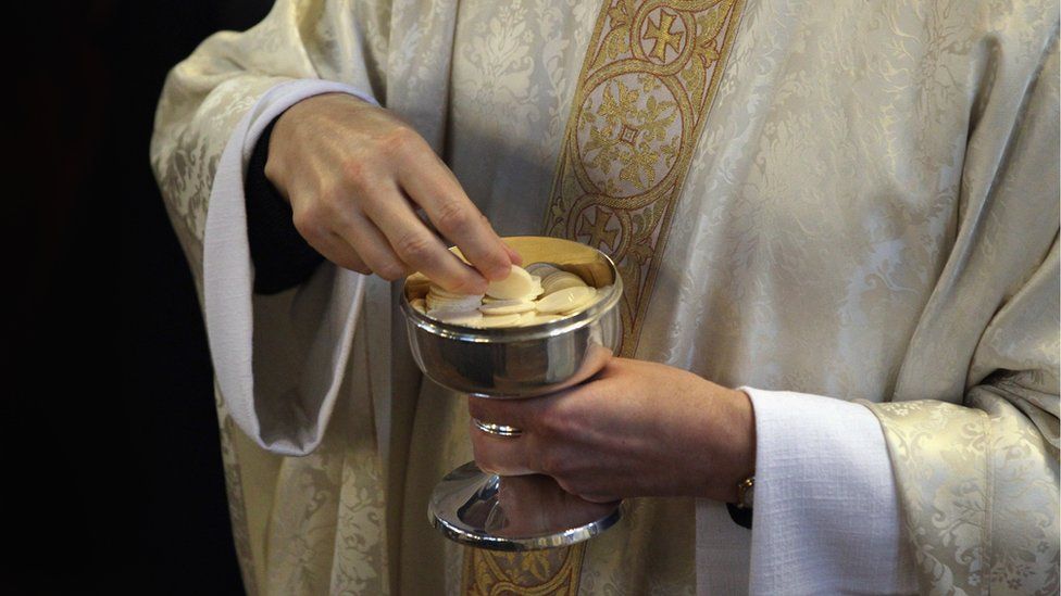 A communion service being held