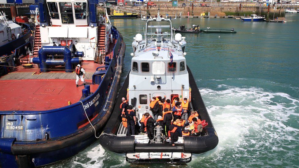 Migrants being brought to Dover on Thursday