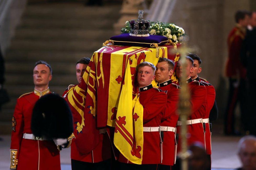 Pallbearers carrying the Queen's coffin into Westminster Hall