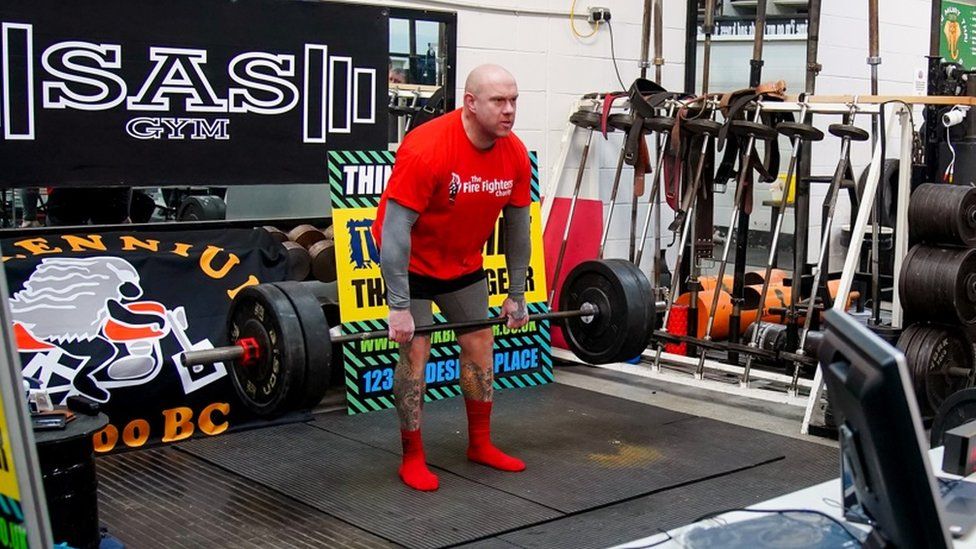 Firefighter Glen Bailey, 42, attempts to break the Guinness World Record for the most weight lifted in 24 hours