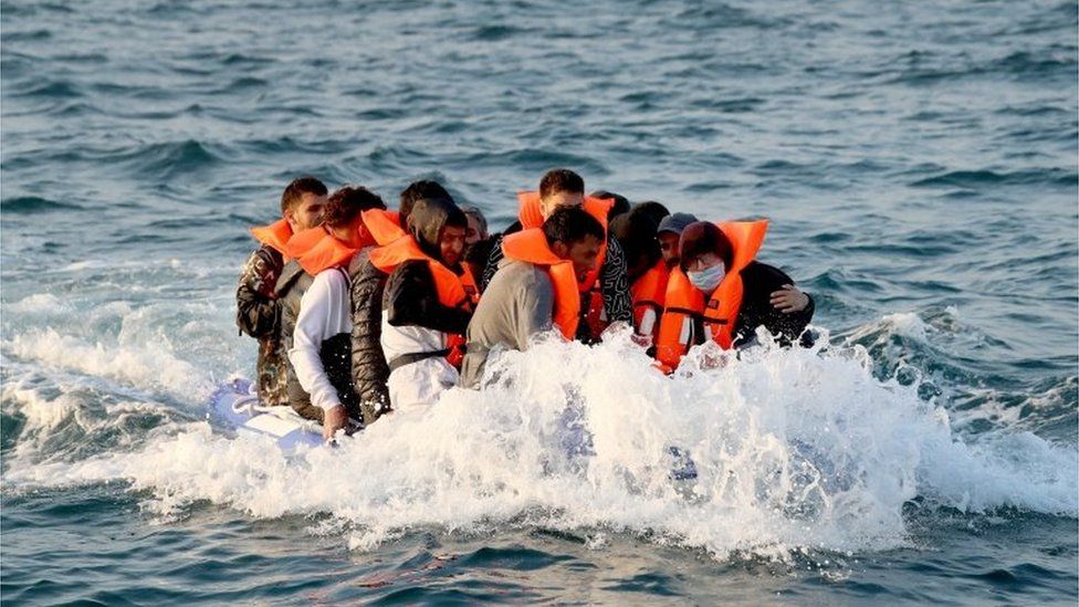 A group of people thought to be migrants crossing the Channel in a small boat headed in the direction of Dover