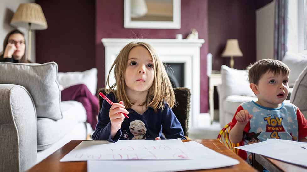 Portrait of the photographer's children at home, home-schooling