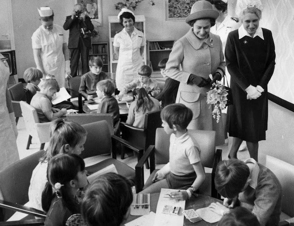 The Queen talks to children at the hospital