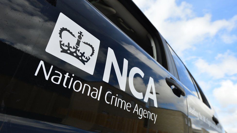A van with an National Crime Agency logo