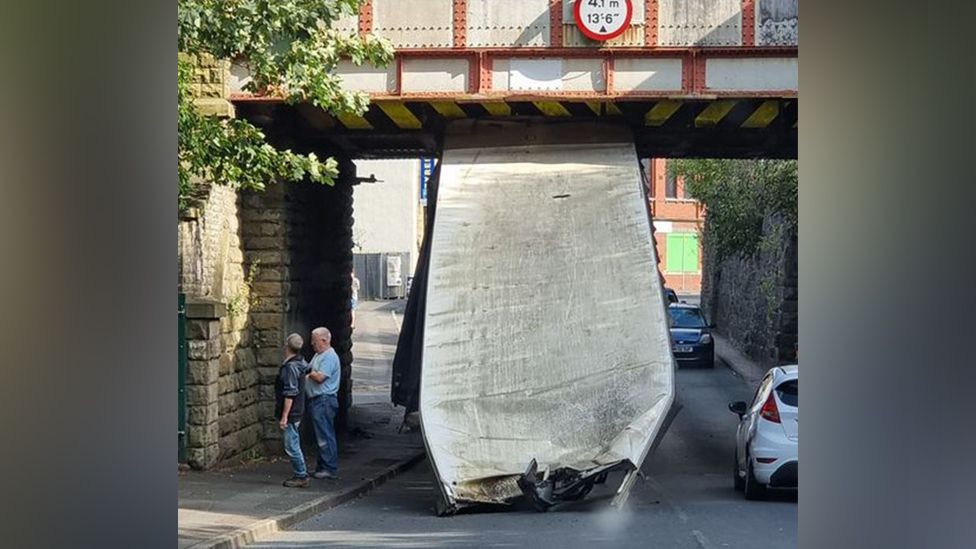 Lorry under bridge at Church and Oswaldtwistle railway station