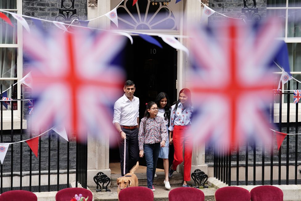 Prime Minister Rishi Sunak with dog Nova and wife, Akshata Murty, with children Krishna Sunak (left) and Anoushka Sunak before hosting a Coronation Big Lunch in Downing Street, London, for volunteers, Ukrainian refugees in the UK, and youth groups