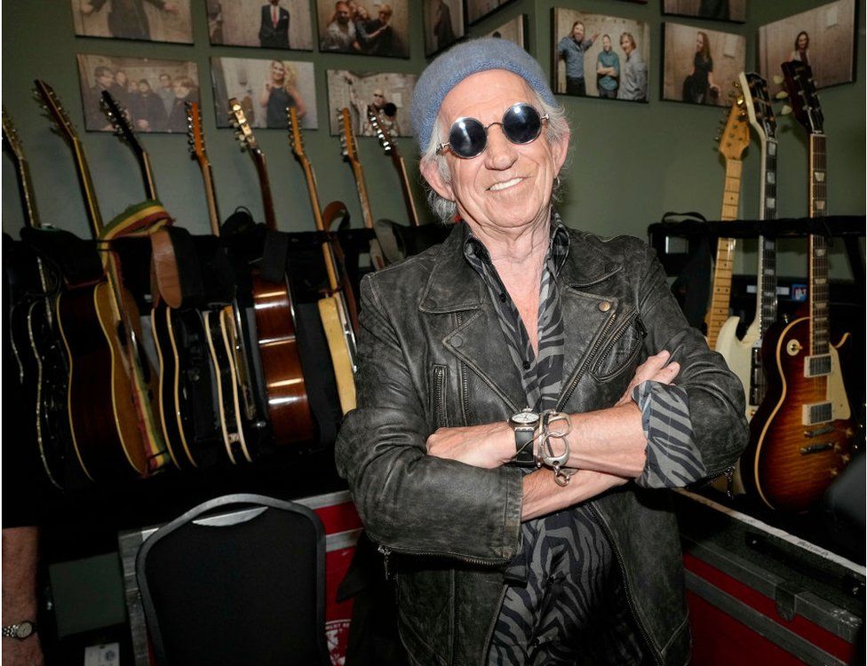 Keith Richards with a selection of guitars