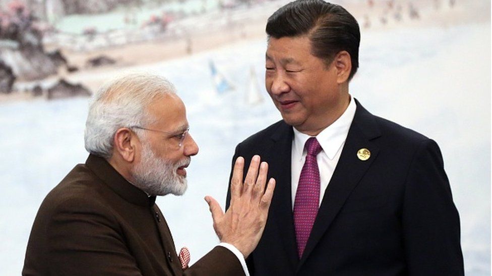 Indian Prime Minister Modi, Narendra (L) greets Chinese President Xi Jinping (R) prior to the dinner on September 4, 2017