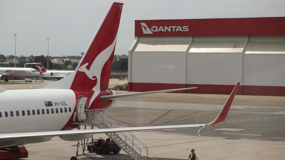 A Qantas flight at an airport