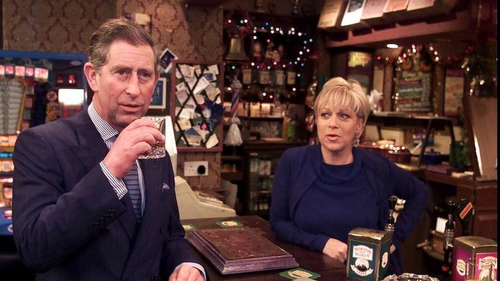 The Prince of Wales with Coronation Streets landlady Natalie Barnes played by Denise Welch for the show's 40th anniversary