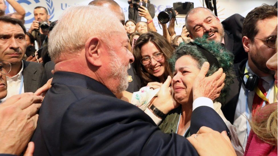 Emotional supporters cheered and sang when Lula appeared