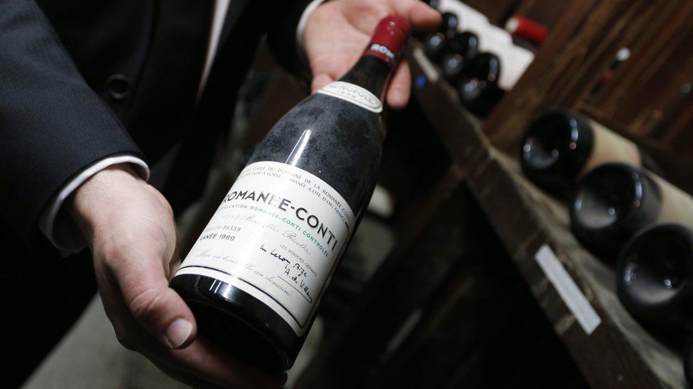 A bottle from of wine from Domaine de la Romanée-Conti farm