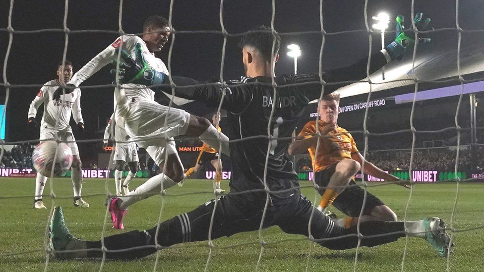 Will Evans scores Newport's second to bring the game level against Manchester United