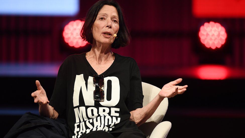 Fashion designer Katharine Hamnett wearing a t-shirt that says 'No more fashion victims'