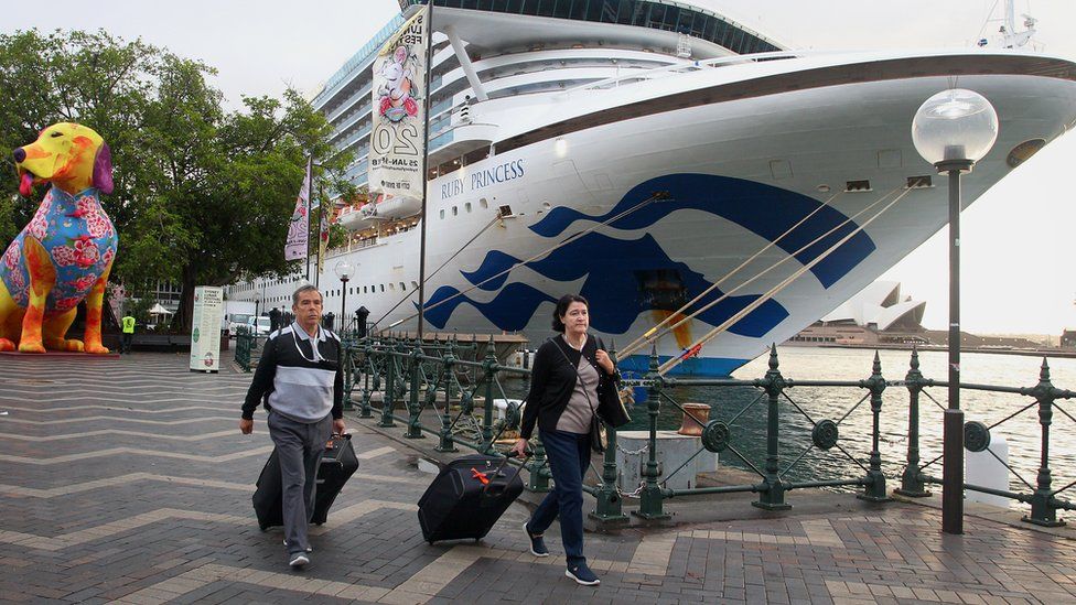 Passengers disembarking from an earlier Ruby Princess voyage in February in Sydney