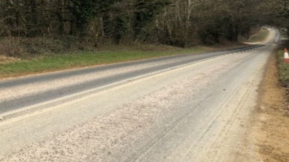 A road covered with dust