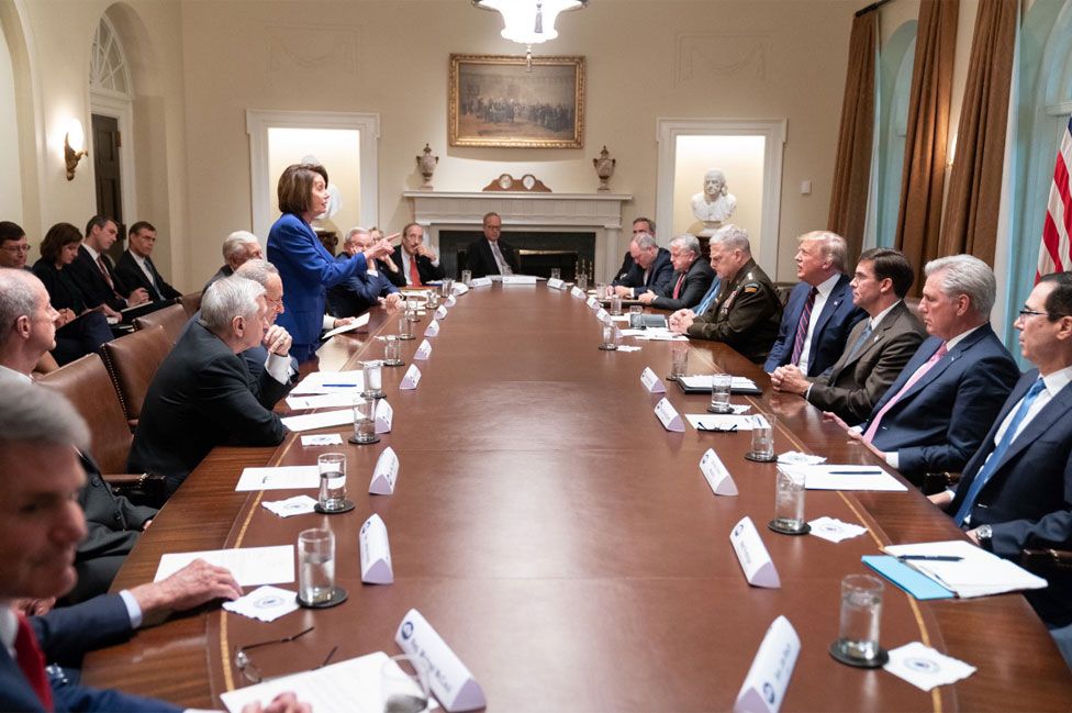 Nancy Pelosi stands up and points during an explosive meeting on Syria