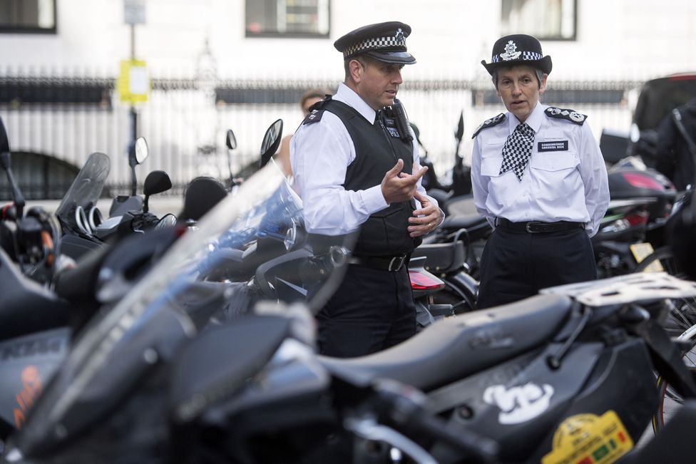 Metropolitan Police Commissioner Cressida Dick (right) meets scooter, motorcycle and moped riders in Westminster, London, as part of the Met Police's Be Safe campaign around preventing the theft of scooters.