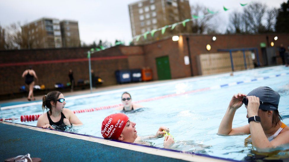 People at Charlton lido in south east London on 29 March 2021