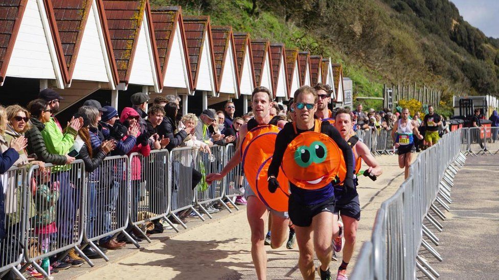 The team in costume at an earlier race