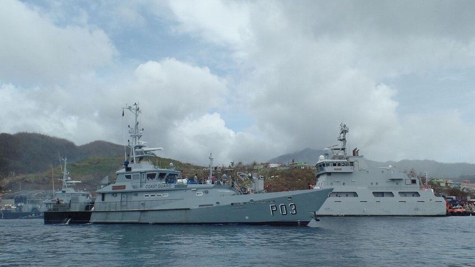 A Coast Guard ship can be seen off Dominica