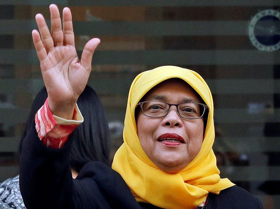 Former speaker of Singapore's parliament, Halimah Yacob, arrives at the Elections Department after she was given the certificate of eligibility to contest the election by the Presidential Elections Committee in Singapore 11 September 2017.