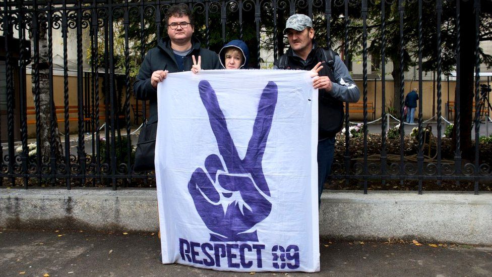 Alexandru Catalin Giurcanu (L) with Aurel Dumitrascu (R) outside the Supreme Court