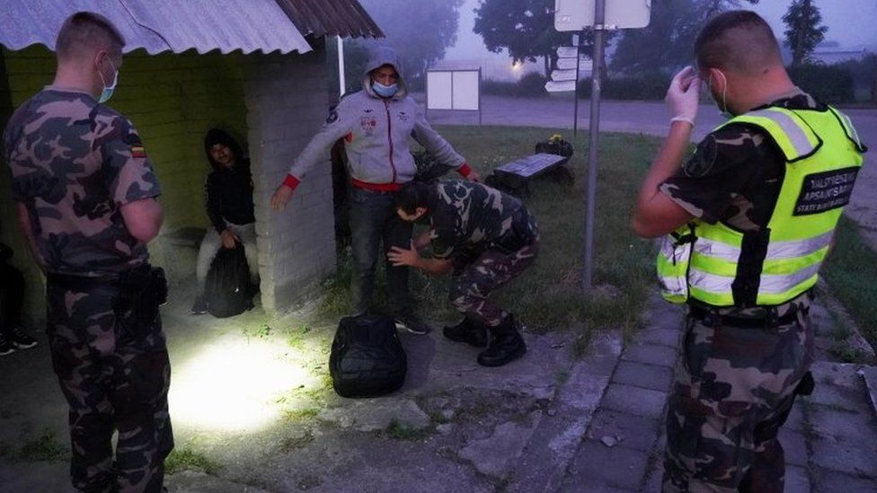 Lithuanian border guards detain migrants on Lithuania-Belarus border in Kalviai, Lithuania. Photo: 7 July 2021