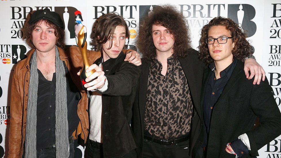 Catfish and the Bottlemen with their award
