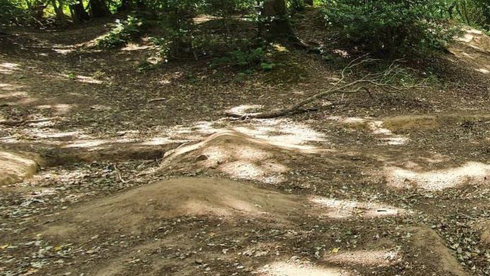 Trails and ramps created by cyclists at the site
