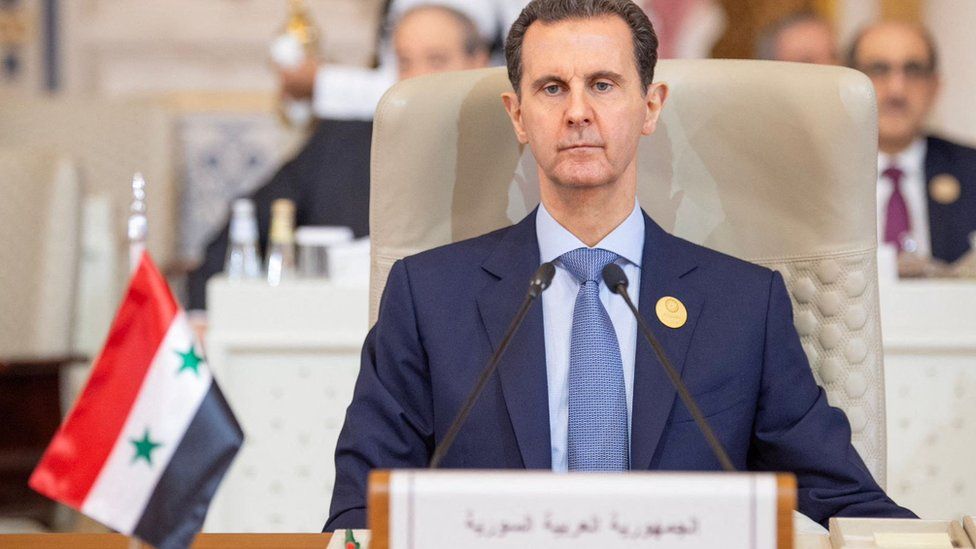 Syrian President Bashar al-Assad (L) attends the Joint Arab Islamic Extraordinary Summit in Riyadh, Saudi Arabia (11 November 2023)
