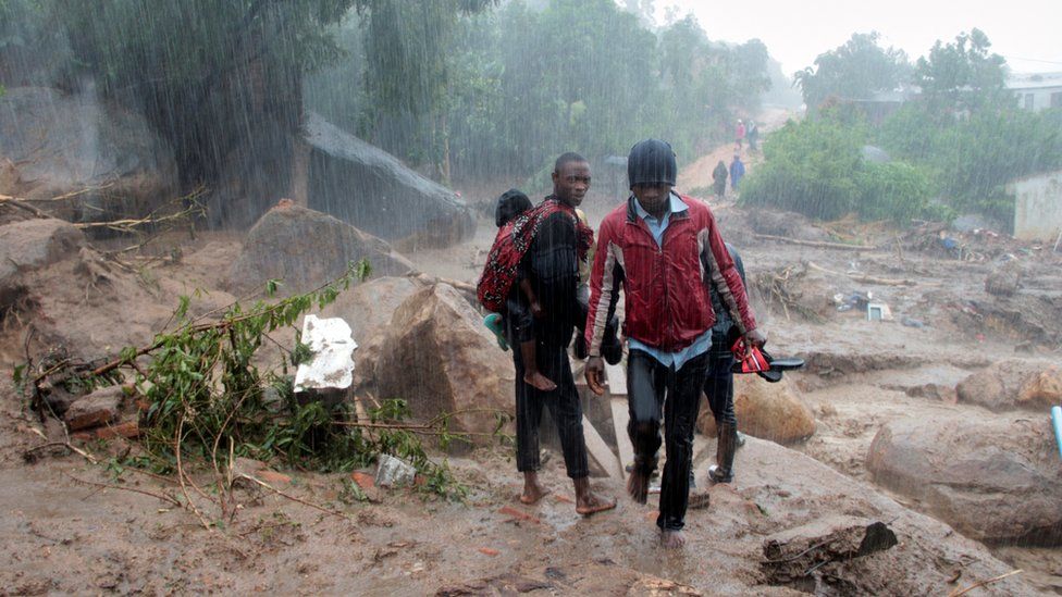 Residents survey the damage caused by Cyclone Freddy in Chilobwe, Blantyre, Malawi